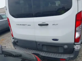 2017 Ford Transit XL z VIN 1FBZX2YM1HKA98823, wystawiony jako IAAI lot #42066291 z przebiegiem 100 011 mil mil oraz . Historia ofert i sprzedaży dostępna na DreamBid. Obrazek 17.