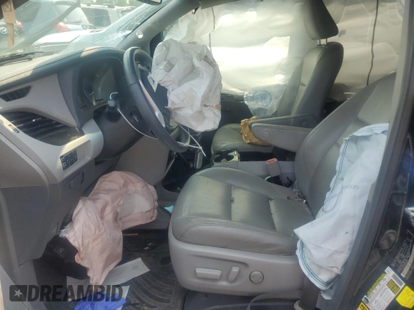 2017 Toyota Sienna XLE with VIN 5TDDZ3DC6HS186360, listed as a Copart auction lot 57504965 with 99,026 mi miles and Salvage title. Bid and sale history available at DreamBid. Image 7.