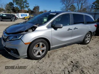 2020 Honda Odyssey EX-L with VIN 5FNRL6H73LB056720, listed as a Copart auction lot 87205024 with 60,219 mi miles and Salvage Title. Bid and sale history available at carsss.com. Image 1.