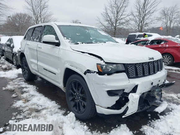 2017 Jeep Grand Cherokee Laredo with VIN 1C4RJFAG2HC951071, listed as a IAAI auction lot 41536568 with 99,941 mi miles. Bid and sale history available at carsss.com. Image 1.