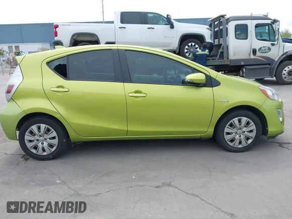 2015 Toyota Prius One with VIN JTDKDTB39F1091097, listed as a IAAI auction lot 41982359 with 202,979 mi miles and . Bid and sale history available at carsss.com. Image 14.