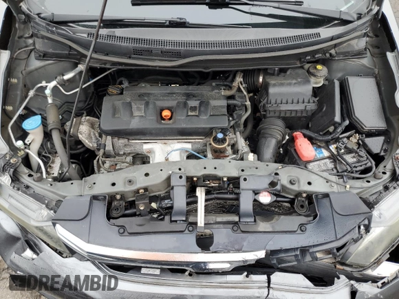 2012 Honda Civic LX z VIN 2HGFB2F50CH324974, wystawiony jako Copart lot #57442305 z przebiegiem 124 462 mil mil oraz Szkoda całkowita • Salvage title. Historia ofert i sprzedaży dostępna na DreamBid. Obrazek 11.