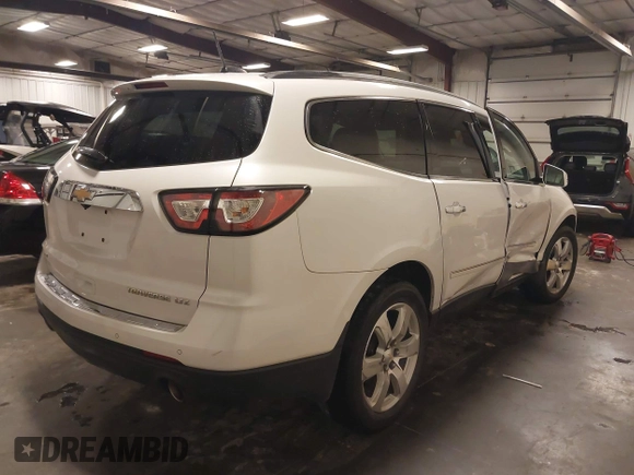 2016 Chevrolet Traverse LTZ with VIN 1GNKVJKD5GJ103247, listed as a IAAI auction lot 42041275 with 106,961 mi miles and . Bid and sale history available at DreamBid. Image 4.