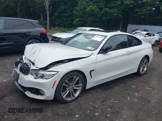 2015 BMW 4 Series 428i xDrive z VIN WBA3N9C56FK246359, wystawiony jako IAAI lot #39911529 z przebiegiem 137 494 mil mil oraz . Historia ofert i sprzedaży dostępna na DreamBid. Obrazek 2.