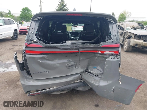 2022 Chrysler Pacifica Hybrid Limited with VIN 2C4RC1S74NR212475, listed as a IAAI auction lot 42264228 with 48,839 mi miles and . Bid and sale history available at DreamBid. Image 6.