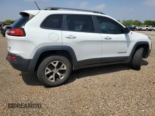 2014 Jeep Cherokee Trailhawk with VIN 1C4PJMBS9EW140344, listed as a Copart auction lot 50579005 with 117,326 mi miles and Salvage Title. Bid and sale history available at carsss.com. Image 3.