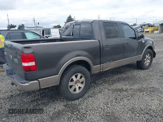 2005 Ford F-150 XLT with VIN 1FTPW12555KE71004, listed as a IAAI auction lot 42023000 with 185,051 mi miles. Bid and sale history available at carsss.com. Image 4.