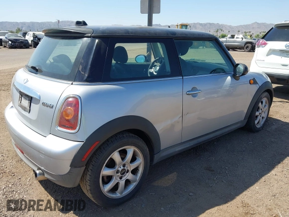 2007 MINI Hardtop with VIN WMWMF33547TL77235, listed as a IAAI auction lot 42547245 with 144,179 mi miles and . Bid and sale history available at DreamBid. Image 4.
