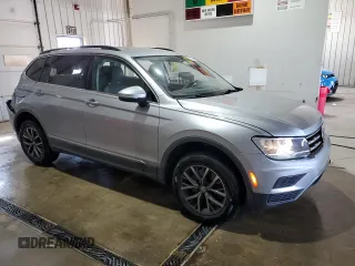 2020 Volkswagen Tiguan SE z VIN 3VV3B7AX2LM075653, wystawiony jako Copart lot #54601595 z przebiegiem 132 879 mil mil oraz Szkody całkowita. Historia ofert i sprzedaży dostępna na DreamBid. Obrazek 4.