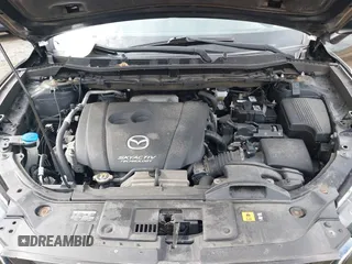 2015 Mazda CX-5 Touring with VIN JM3KE4CY2F0445178, listed as a IAAI auction lot 41828953 with 137,330 mi miles and . Bid and sale history available at DreamBid. Image 10.