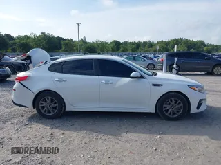 2020 Kia Optima LX with VIN 5XXGT4L30LG390927, listed as a IAAI auction lot 42642424 with 84,697 mi miles and . Bid and sale history available at DreamBid. Image 13.