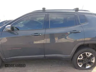 2017 Jeep Compass Trailhawk with VIN 3C4NJDDBXHT657425, listed as a IAAI auction lot 41022289 with 83,003 mi miles and . Bid and sale history available at DreamBid. Image 14.