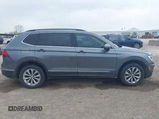 2018 Volkswagen Tiguan SEL with VIN 3VV3B7AX3JM000585, listed as a IAAI auction lot 41905836 with 99,114 mi miles and . Bid and sale history available at DreamBid. Image 13.