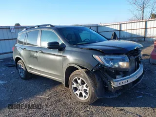 2022 Honda Passport TrailSport with VIN 5FNYF8H67NB029576, listed as a IAAI auction lot 41333708 with 50,913 mi miles and . Bid and sale history available at DreamBid. Image 1.