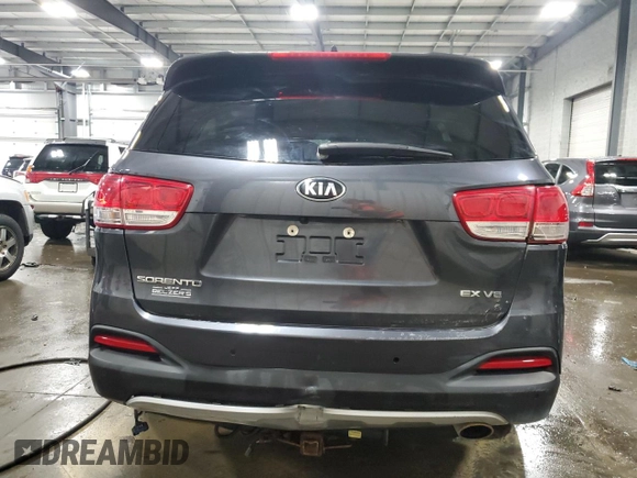 2018 Kia Sorento EX z VIN 5XYPHDA58JG422604, wystawiony jako Copart lot #60475255 z przebiegiem 100 018 mil mil oraz Szkoda całkowita • Salvage title. Historia ofert i sprzedaży dostępna na DreamBid. Obrazek 6.