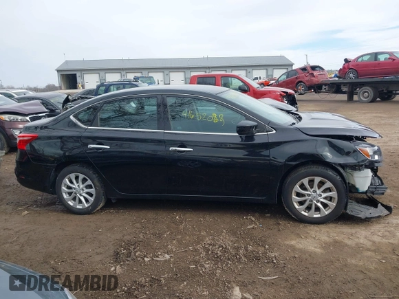2019 Nissan Sentra SV z VIN 3N1AB7AP9KY389431, wystawiony jako IAAI lot #41652025 z przebiegiem 81 241 mil mil oraz . Historia ofert i sprzedaży dostępna na DreamBid. Obrazek 14.