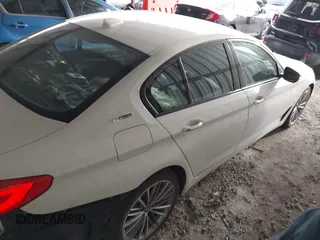 2018 BMW 5 Series 530e with VIN WBAJA9C57JB034128, listed as a IAAI auction lot 41800329 with 66,684 mi miles and . Bid and sale history available at DreamBid. Image 4.