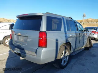 2016 Chevrolet Tahoe LS with VIN 1GNSCAKC0GR413515, listed as a IAAI auction lot 41249760 with 163,107 mi miles. Bid and sale history available at carsss.com. Image 4.