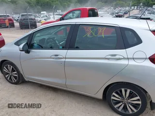 2015 Honda Fit EX-L z VIN 3HGGK5H8XFM730425, wystawiony jako IAAI lot #42503809 z przebiegiem 105 469 mil mil oraz . Historia ofert i sprzedaży dostępna na DreamBid. Obrazek 14.