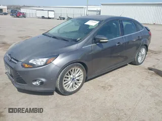 2014 Ford Focus Titanium with VIN 1FADP3J21EL299718, listed as a IAAI auction lot 41788080 with 91,748 mi miles. Bid and sale history available at carsss.com. Image 2.