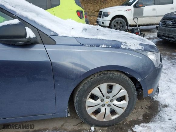 2014 Chevrolet Cruze LS with VIN 1G1PB5SG7E7142059, listed as a IAAI auction lot 41435050 with 106,067 mi miles. Bid and sale history available at carsss.com. Image 14.