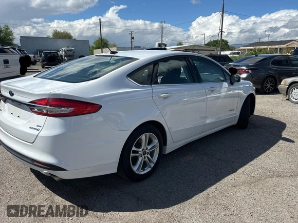 2018 Ford Fusion Hybrid SE with VIN 3FA6P0LU5JR173833, listed as a Copart auction lot 55092565 with 83,242 mi miles and Clean Title. Bid and sale history available at carsss.com. Image 4.