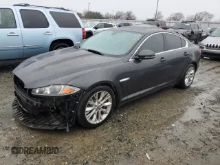 2013 Jaguar XF RWD with VIN SAJWA0E77D8S69022, listed as a Copart auction lot 43641795 with 157,695 mi miles and Salvage Title. Bid and sale history available at DreamBid. Image 1.