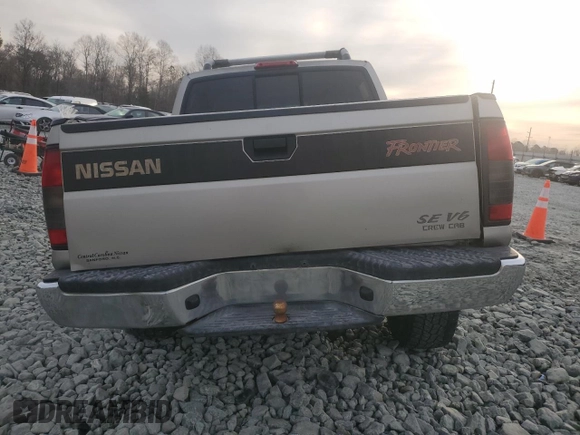 2000 Nissan Frontier XE with VIN 1N6ED27Y3YC366060, listed as a Copart auction lot 48955585 with 158,565 mi miles and Salvage title. Bid and sale history available at DreamBid. Image 6.