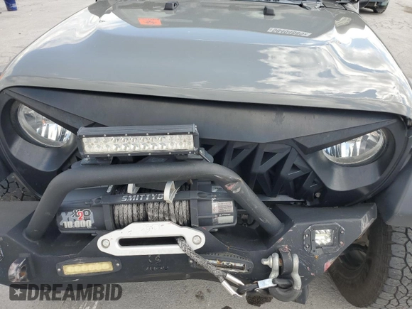 2020 Jeep Wrangler Unlimited Sport S with VIN 1C4HJXDN4LW344401, listed as a Copart auction lot 58404885 with 68,074 mi miles and Salvage title. Bid and sale history available at DreamBid. Image 12.