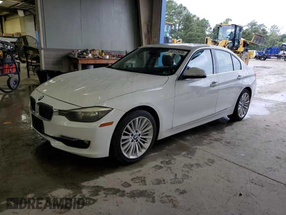 2013 BMW 3 Series 328i with VIN WBA3A5G52DNP18972, listed as a Copart auction lot 58122935 with 209,173 mi miles and Salvage title. Bid and sale history available at DreamBid. Image 1.
