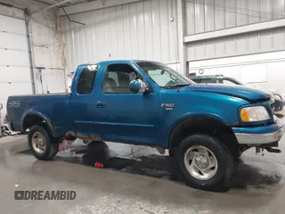 2000 Ford F-150 XL z VIN 1FTRX18L7YKB27657, wystawiony jako IAAI lot #42262373 z przebiegiem Nie podano mil oraz . Historia ofert i sprzedaży dostępna na DreamBid. Obrazek 13.