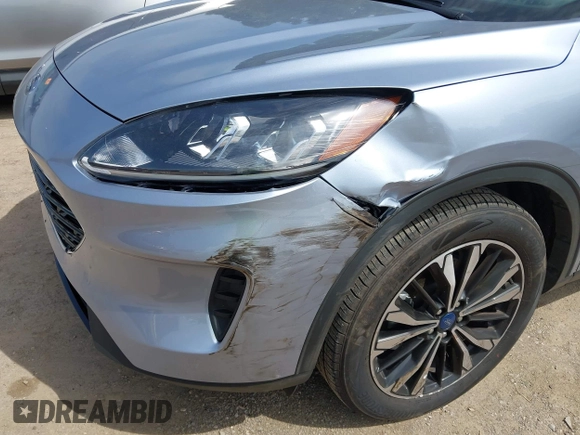2022 Ford Escape SE z VIN 1FMCU0G68NUB64197, wystawiony jako IAAI lot #42279268 z przebiegiem 10 579 mil mil oraz . Historia ofert i sprzedaży dostępna na DreamBid. Obrazek 6.