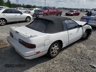 1993 Nissan 240SX SE Limited Edition z VIN JN3MS37AXPW202518, wystawiony jako Copart lot #51807405 z przebiegiem 260 905 mil mil oraz Szkody całkowita. Historia ofert i sprzedaży dostępna na DreamBid. Obrazek 3.