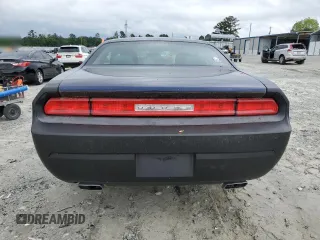 2013 Dodge Challenger SXT z VIN 2C3CDYAG8DH609306, wystawiony jako Copart lot #55772985 z przebiegiem 179 231 mil mil oraz Szkody całkowita. Historia ofert i sprzedaży dostępna na DreamBid. Obrazek 6.