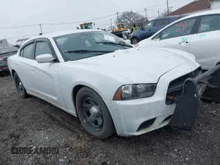 2012 Dodge Charger Police with VIN 2C3CDXAT6CH226843, listed as a IAAI auction lot 41891015 with 164,969 mi miles. Bid and sale history available at carsss.com. Image 1.