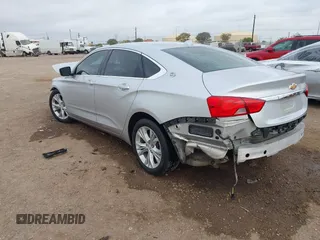 2014 Chevrolet Impala LT with VIN 2G1125S38E9102607, listed as a IAAI auction lot 41860235 with 128,599 mi miles and . Bid and sale history available at DreamBid. Image 3.