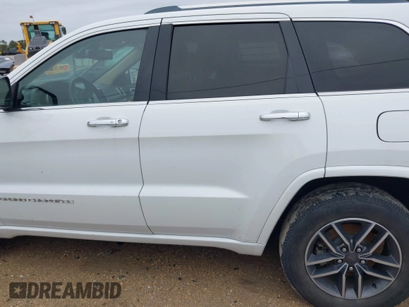 2014 Jeep Grand Cherokee Overland with VIN 1C4RJECG4EC543092, listed as a IAAI auction lot 40981315 with 149,096 mi miles. Bid and sale history available at carsss.com. Image 15.