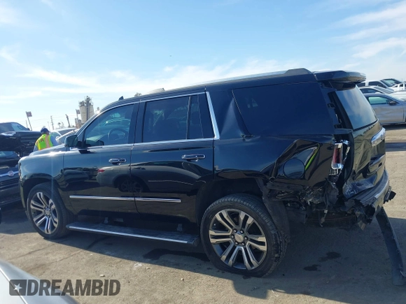 2019 GMC Yukon Denali with VIN 1GKS2CKJ4KR191886, listed as a IAAI auction lot 41198227 with 74,325 mi miles. Bid and sale history available at carsss.com. Image 14.