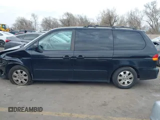 2004 Honda Odyssey EX-L with VIN 5FNRL18914B037976, listed as a IAAI auction lot 41893438 with Not Provided miles and . Bid and sale history available at DreamBid. Image 14.
