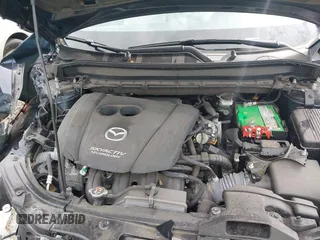 2019 Mazda CX-5 Grand Touring with VIN JM3KFBDM8K1521231, listed as a IAAI auction lot 42738963 with 32,179 mi miles and . Bid and sale history available at DreamBid. Image 10.
