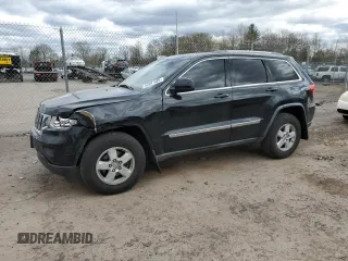 2012 Jeep Grand Cherokee Laredo with VIN 1C4RJFAG8CC199448, listed as a Copart auction lot 52691485 with 121,605 mi miles and Salvage Title. Bid and sale history available at carsss.com. Image 1.