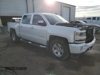 2016 Chevrolet Silverado 1500 LT with VIN 3GCUKREC3GG357911, listed as a Copart auction lot 43985735 with 145,647 mi miles and Salvage Title. Bid and sale history available at DreamBid. Image 4.