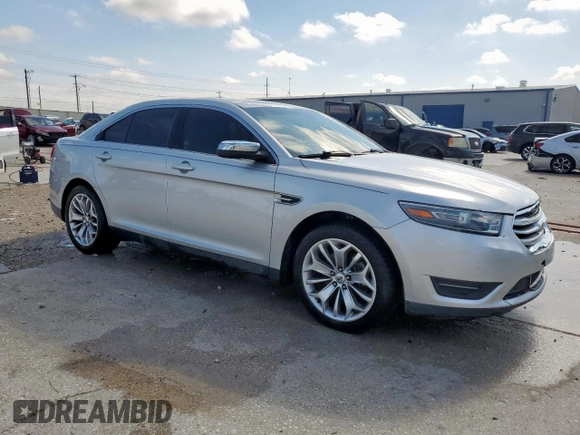 2013 Ford Taurus Limited with VIN 1FAHP2F84DG129904, listed as a Copart auction lot 58218205 with 105,877 mi miles and Salvage title. Bid and sale history available at DreamBid. Image 4.