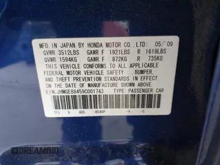 2009 Honda Fit Sport with VIN JHMGE88459C001743, listed as a IAAI auction lot 41852048 with 128,225 mi miles. Bid and sale history available at carsss.com. Image 9.