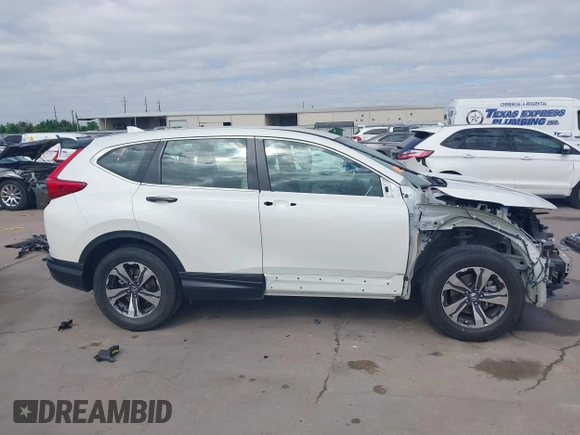 2018 Honda CR-V LX with VIN 2HKRW5H30JH414854, listed as a IAAI auction lot 42003596 with 26,322 mi miles and . Bid and sale history available at DreamBid. Image 14.