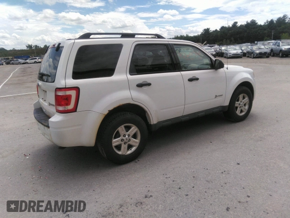 2011 Ford Escape Hybrid с VIN 1FMCU5K39BKC06037, выставлен на аукционе IAAI как лот 42610310 с пробегом 198 549 миль миль и . История ставок и продаж доступна на DreamBid. Изображение 4.
