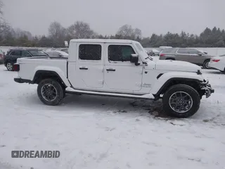 2023 Jeep Gladiator Overland z VIN 1C6HJTFG6PL544489, wystawiony jako IAAI lot #41311654 z przebiegiem 37 630 mil mil oraz . Historia ofert i sprzedaży dostępna na DreamBid. Obrazek 13.
