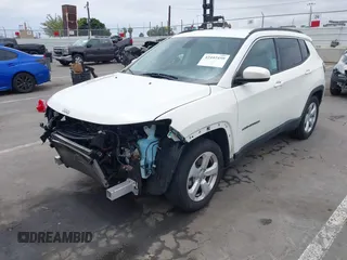 2021 Jeep Compass Latitude with VIN 3C4NJCBB6MT538682, listed as a IAAI auction lot 42442459 with 59,163 mi miles and . Bid and sale history available at DreamBid. Image 2.