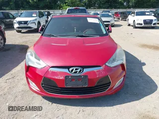 2012 Hyundai Veloster w/Black Int with VIN KMHTC6AD3CU032989, listed as a IAAI auction lot 42633748 with 137,727 mi miles and . Bid and sale history available at DreamBid. Image 6.