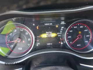 2018 Dodge Charger SXT Plus with VIN 2C3CDXHG9JH281387, listed as a IAAI auction lot 41402210 with 132,881 mi miles and . Bid and sale history available at carsss.com. Image 7.